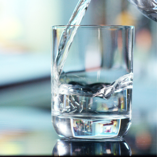 glass of clear water on table